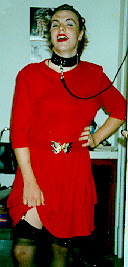 Ben in full drag -- makeup, skirt,
stockings, and a leather collar!